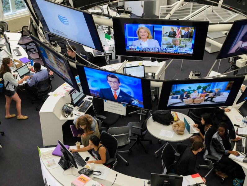 Media Center at Annenberg, a circular desk with televisions displayed above